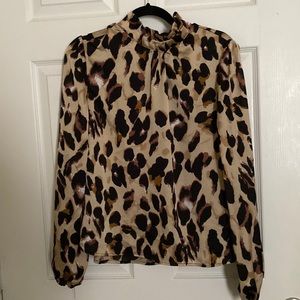 Animal print silky top.